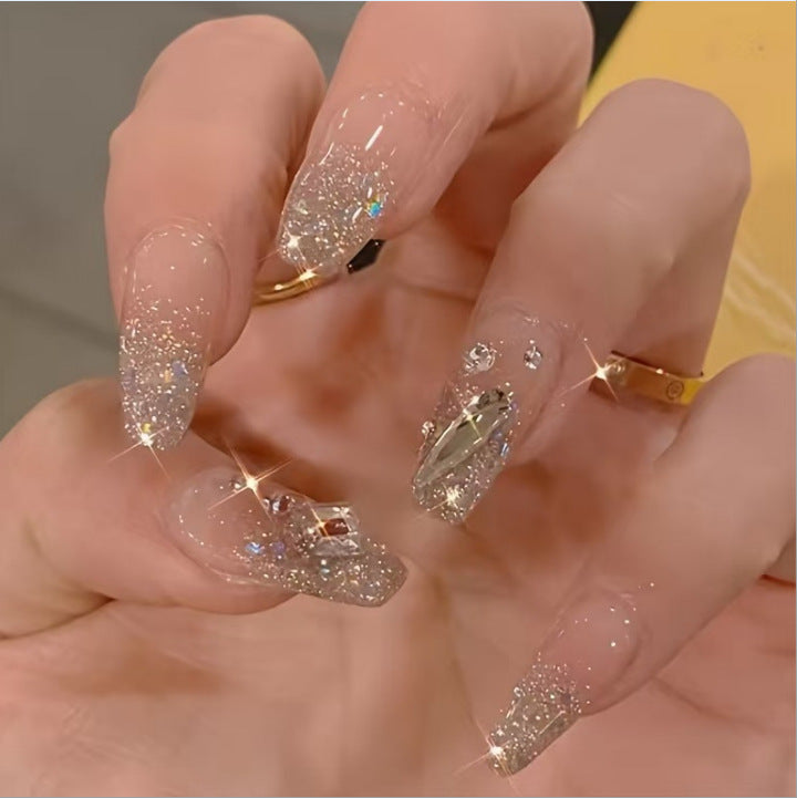 Glamorous nail art with pearls and glitter Bowlift