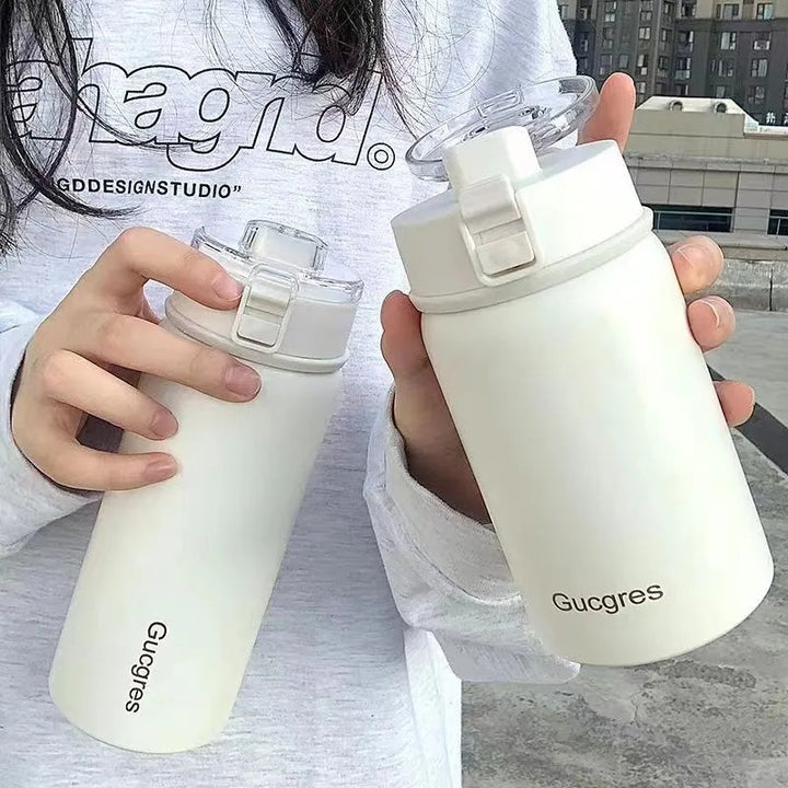 Women's vacuum flask with practical flip top and ergonomic design Bowlift