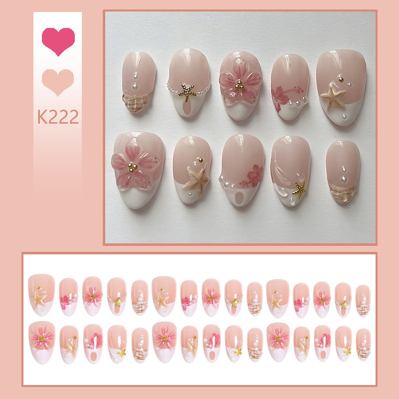 Artificial nail set with floral and maritime designs Bowlift