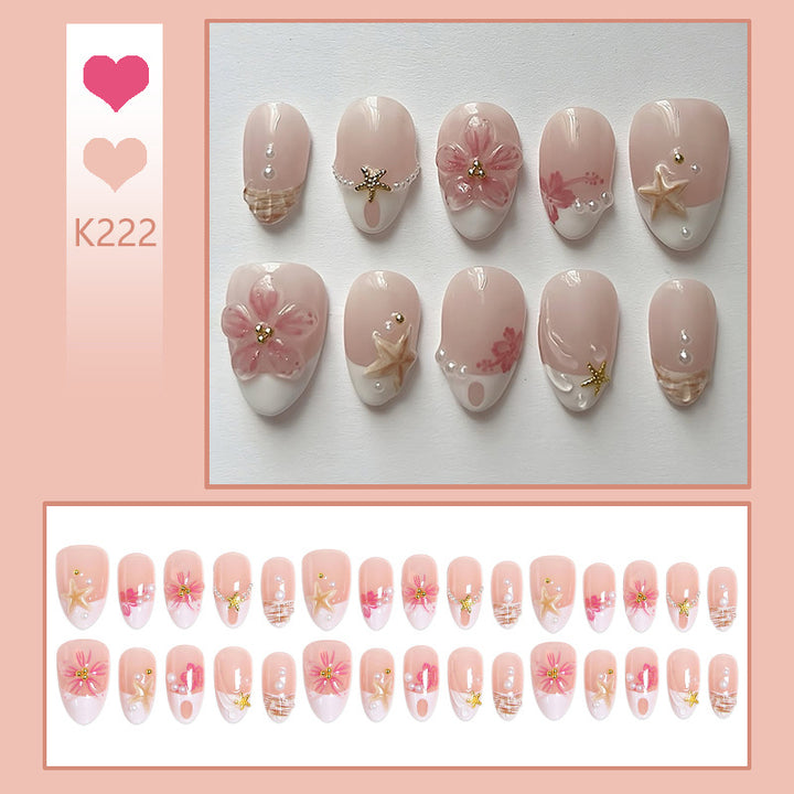 Artificial nail set with floral and maritime designs Bowlift