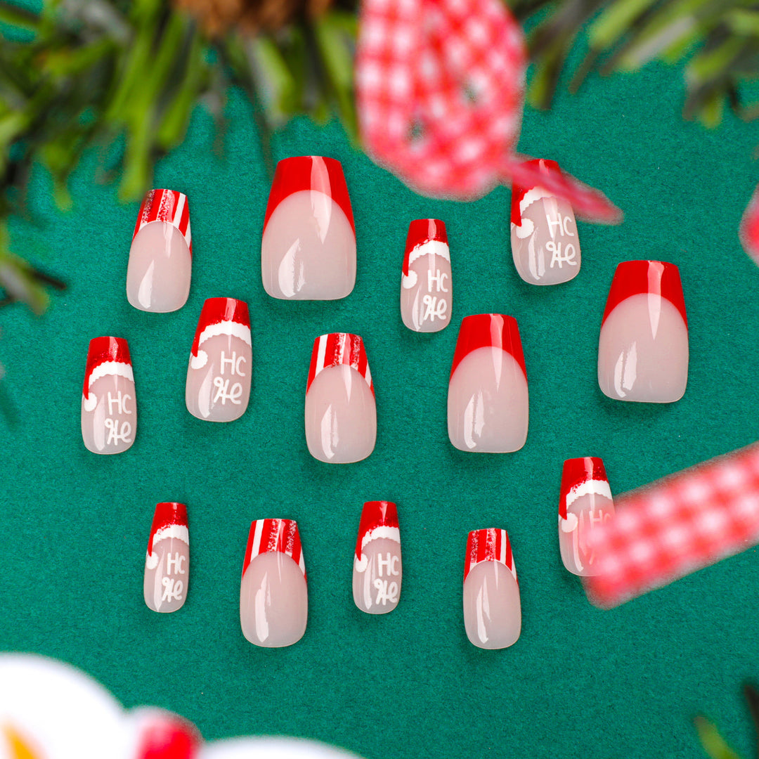 Artificial nail extensions in festive Christmas design Bowlift