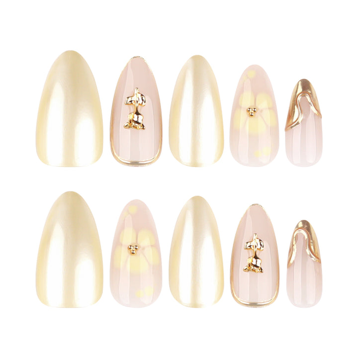 Artful nail art with floral decorations and glitter accents Bowlift