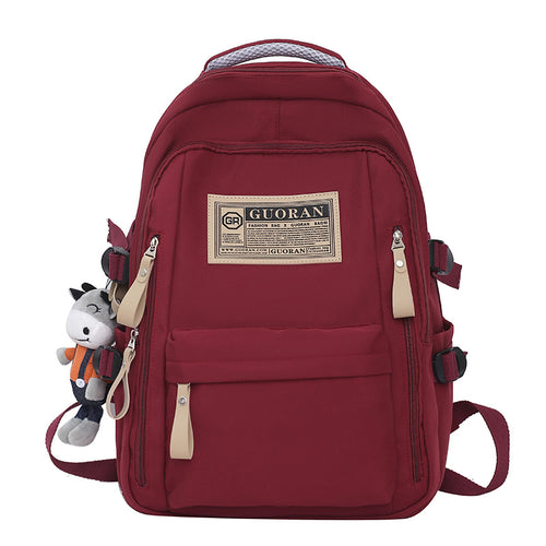 Versatile Casual Backpack with Plush Keychain