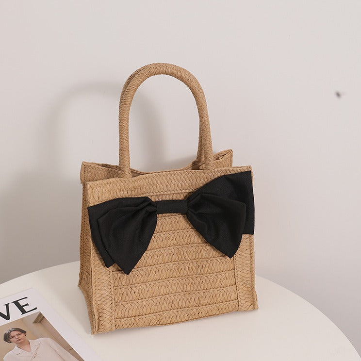 Elegant Bast handbag with bow detail Bowlift