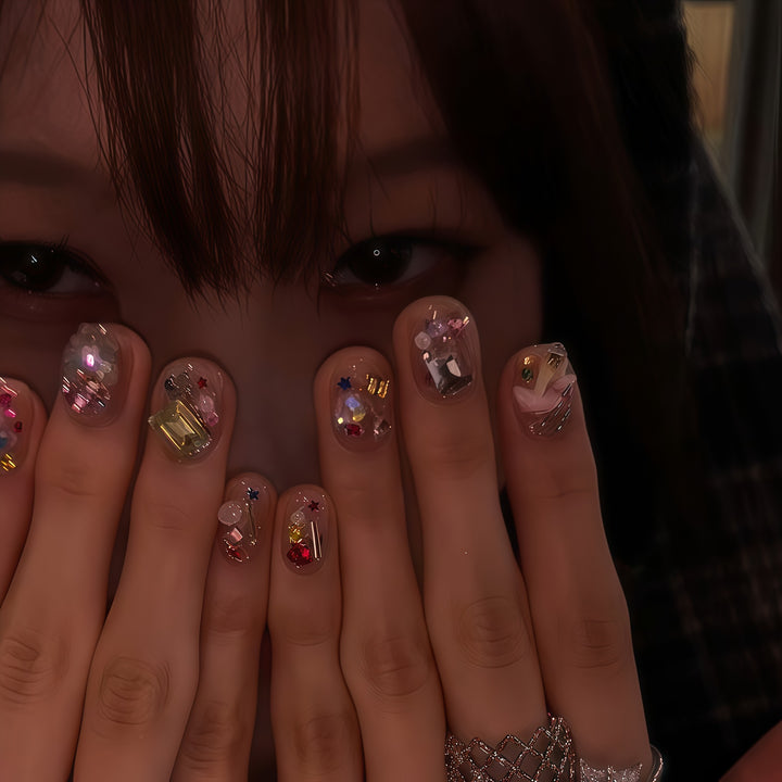Artificial nails with sparkling crystal accents Bowlift