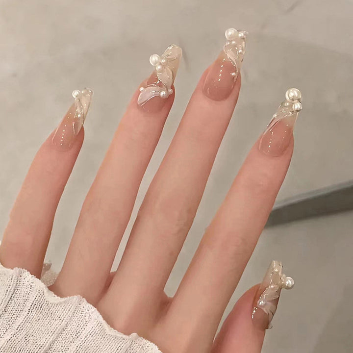 Artificial art nails with heart and glitter elements Bowlift