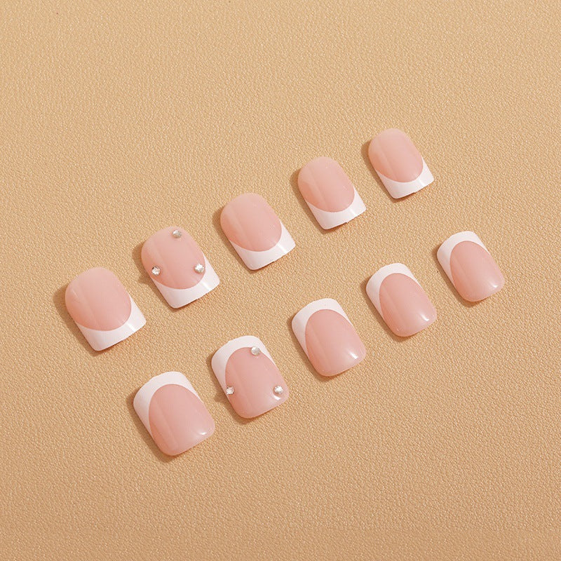 Artificial nails with elegant butterfly embellishments Bowlift