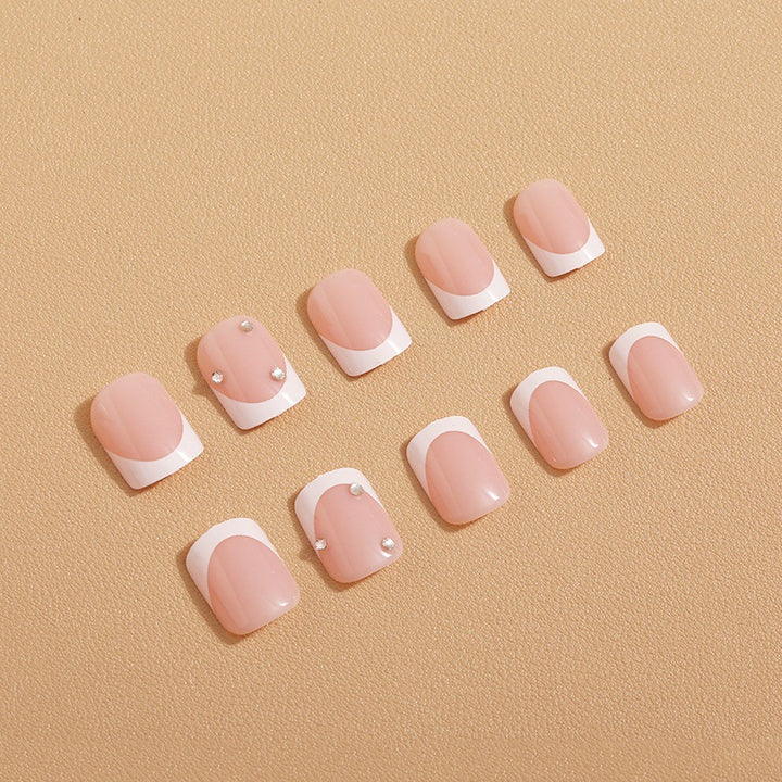 Artificial nails with elegant butterfly embellishments Bowlift