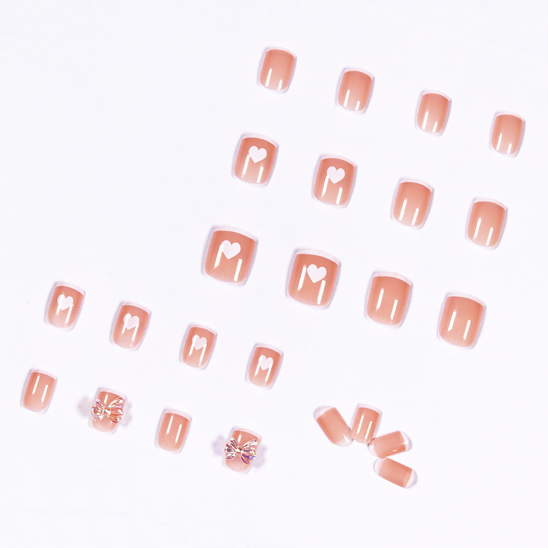 Nail art with heart and butterfly motifs Bowlift