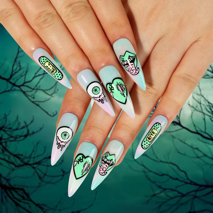 Artistic stiletto nails with creative designs and intricate detailing Bowlift