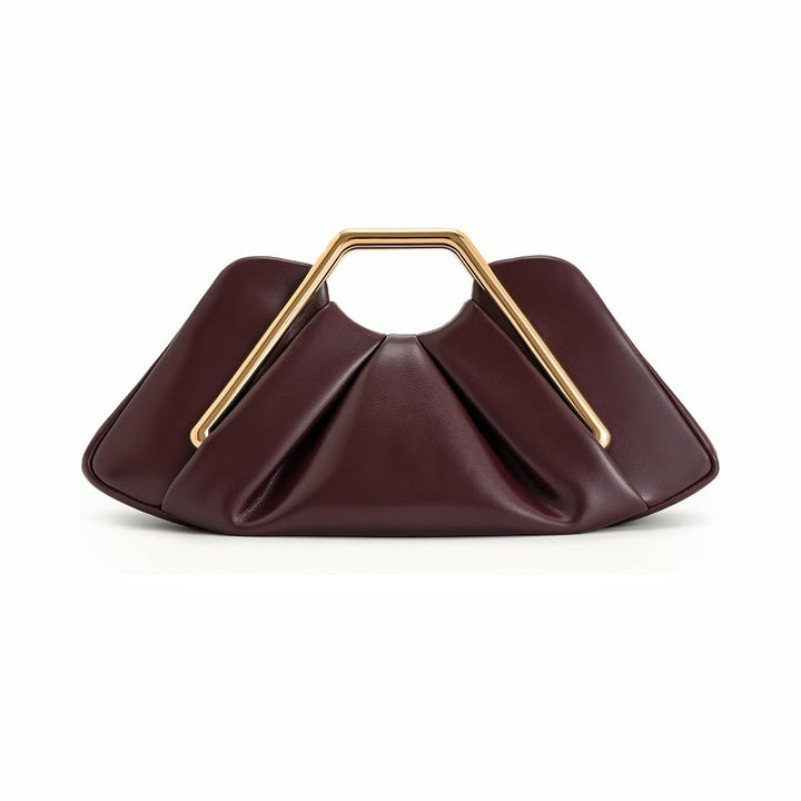 Designer handbag with unique handle Bowlift