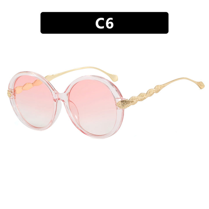 Ladies large round sunglasses with decorative metal accents Bowlift