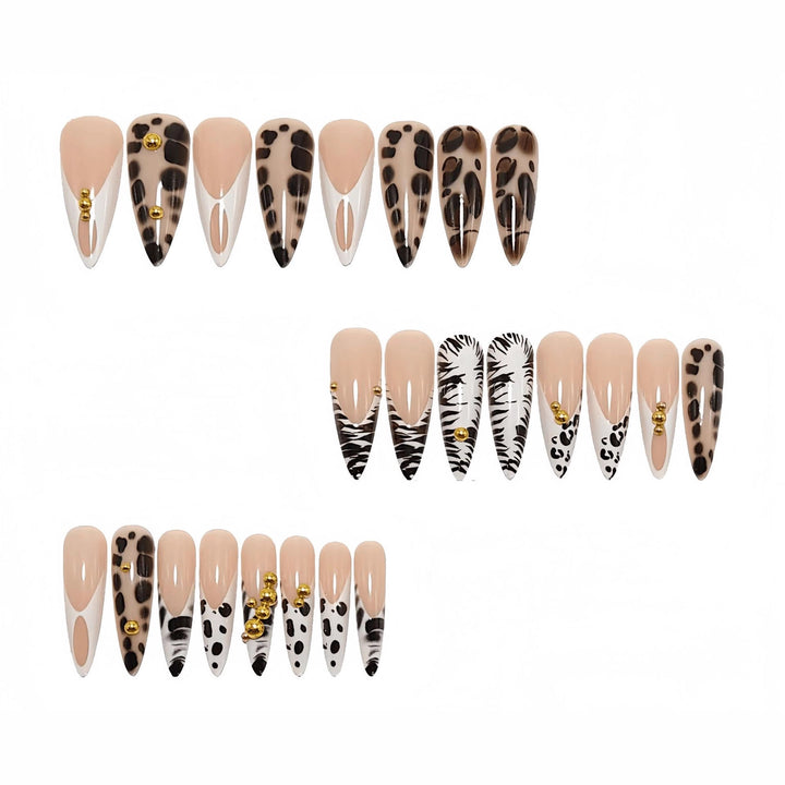 Stiletto fake nails with animal pattern and gold accents Bowlift