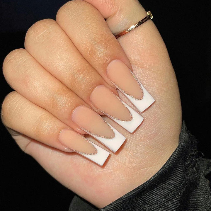 Lacquered stiletto nails with glitter decoration Bowlift