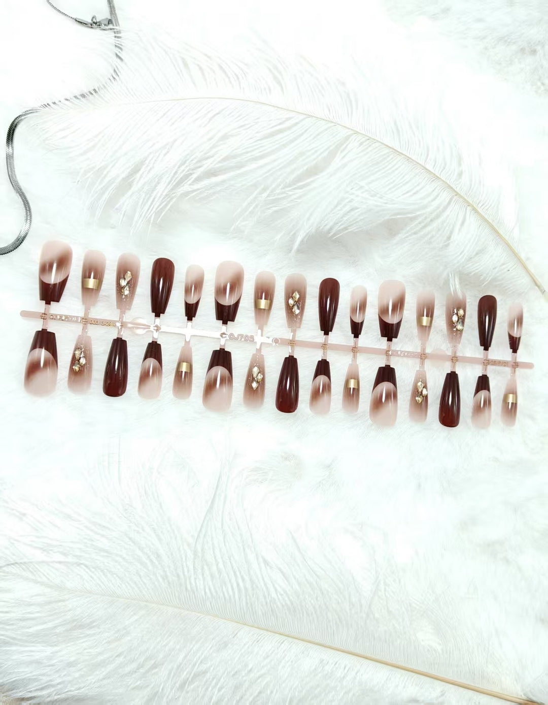 Artificial nails with elegant decorative accents Bowlift