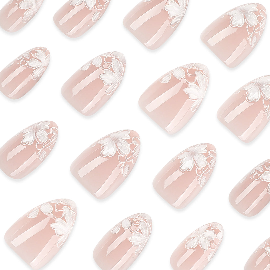Artistic stiletto nails with floral embellishments Bowlift