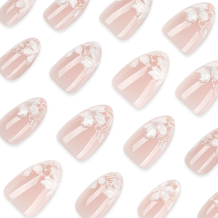 Artistic stiletto nails with floral embellishments Bowlift