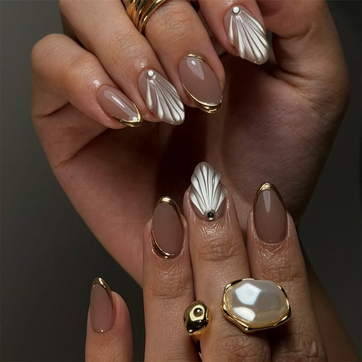Artificial nail set with elegant gold tips and artistic decorations Bowlift