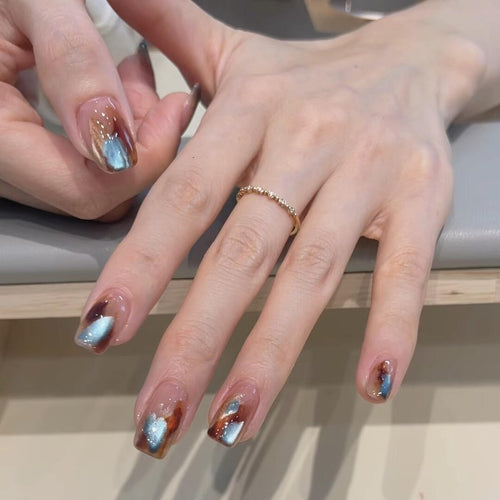 Colorful Art Nails In Modern Marbled Design Bowlift