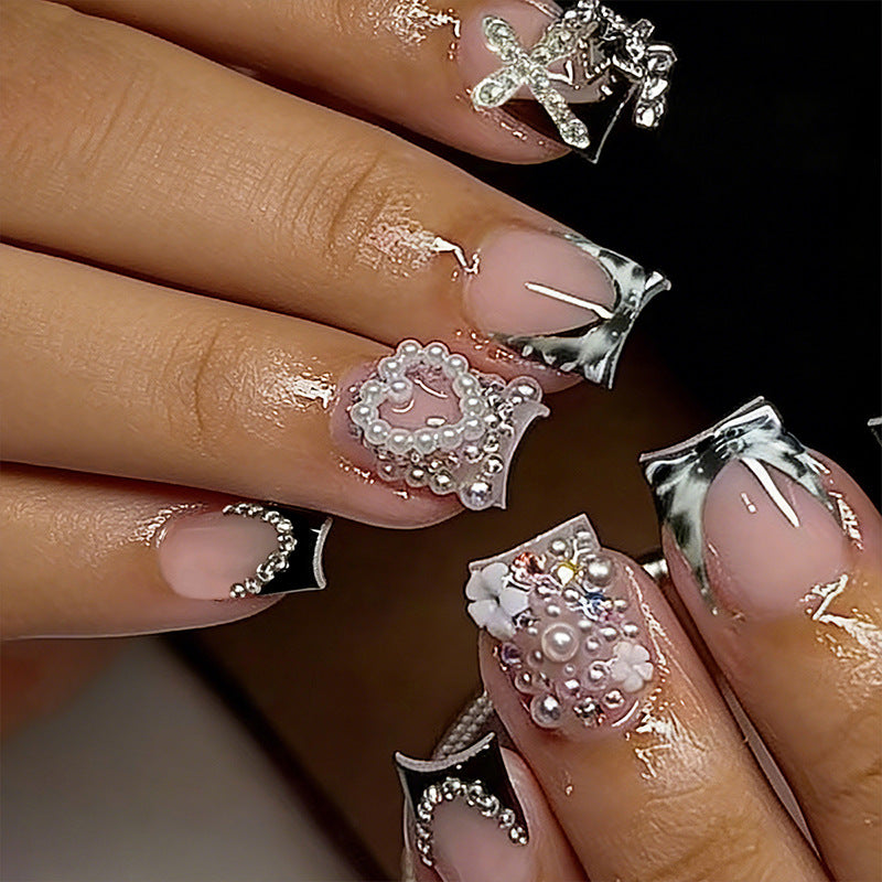 Artistic 3D Nail Tips with Pearl and Bow Accents Bowlift