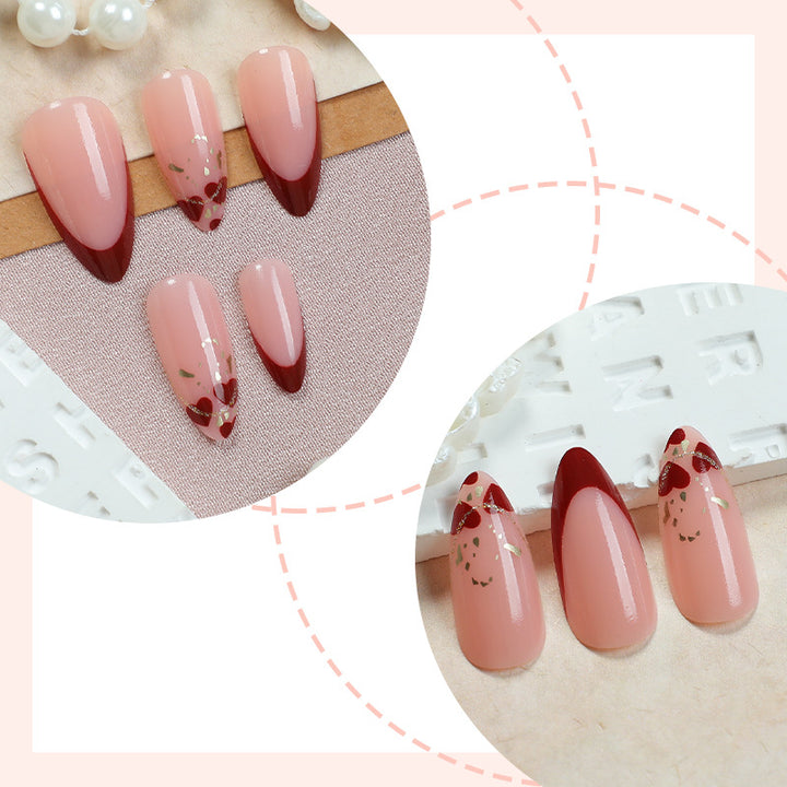 Elegant Stiletto Press-On Nail Set with Decorative Gold Accents Bowlift