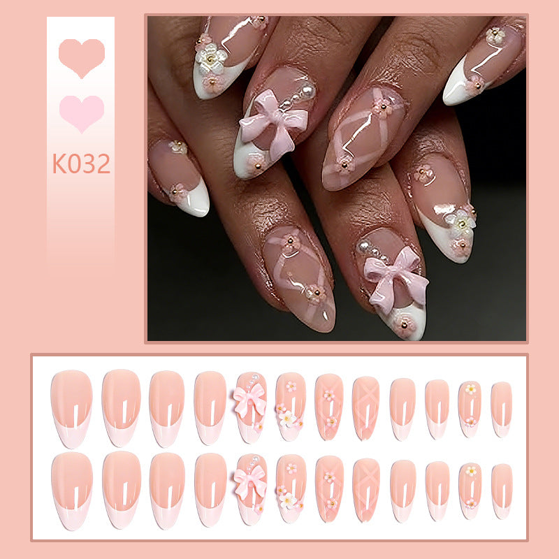 Artful Nail Tips with Ribbons and Floral Decorations Bowlift