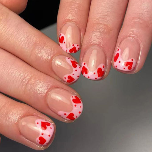 Artfully designed nail tips with heart motifs Bowlift