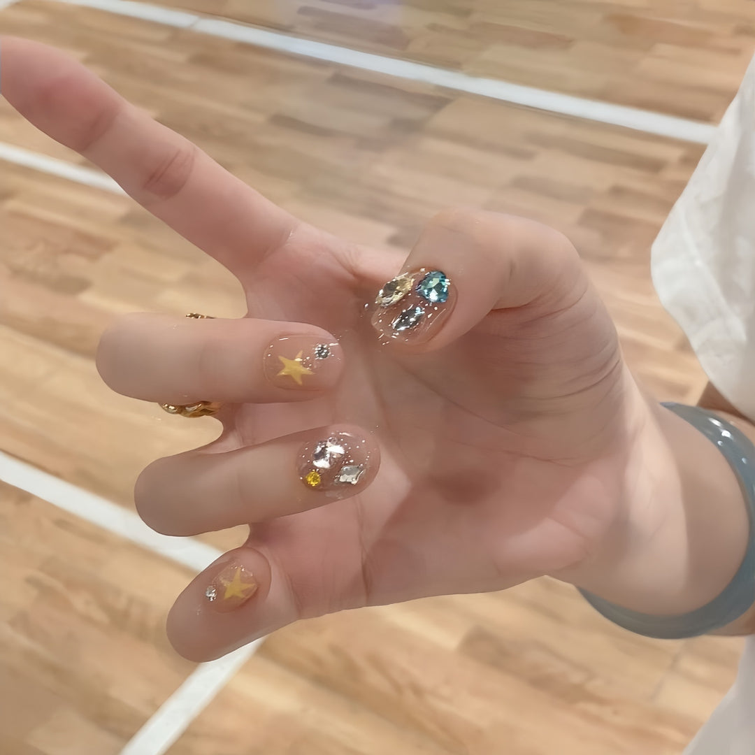 Glittering nail tips with elegant jewelry accents Bowlift