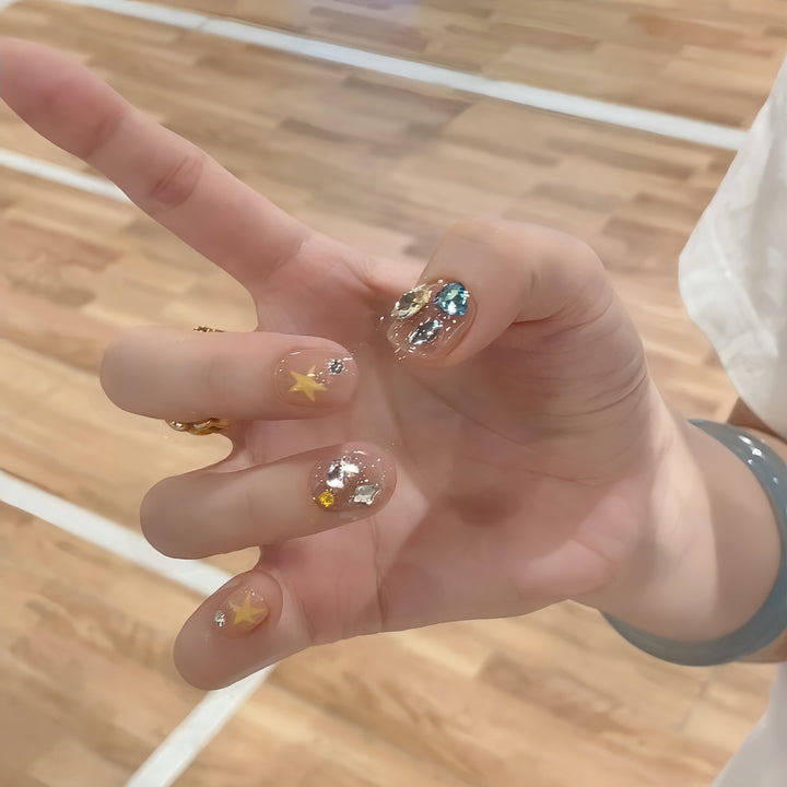 Glittering nail tips with elegant jewelry accents Bowlift