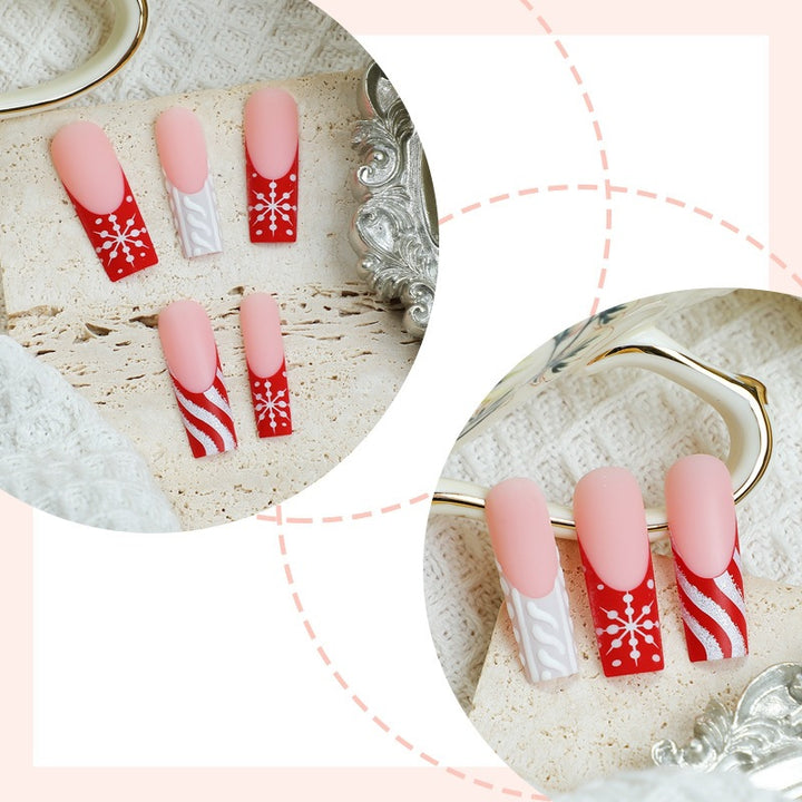 Artificial nail set for festive occasions with elegant winter motifs Bowlift