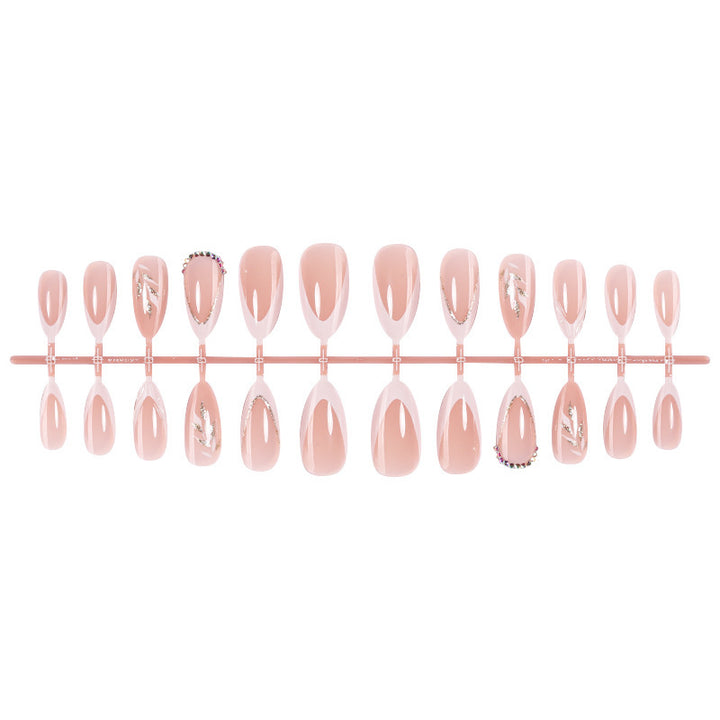 Artificial nail set with elegant tips and glitter accents Bowlift