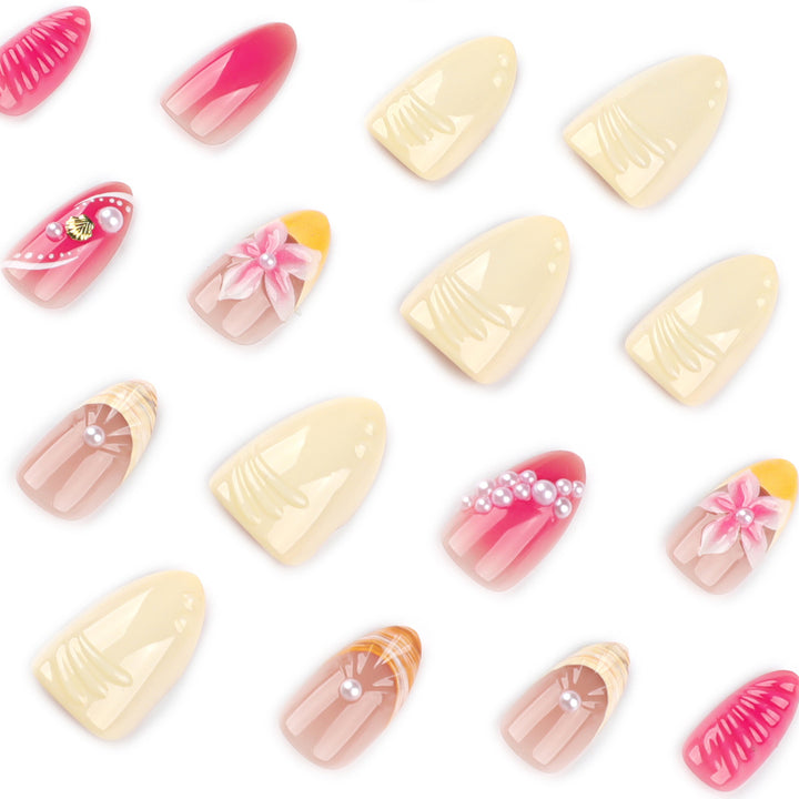 Artful nail extensions with floral and pearl-embellished accents Bowlift