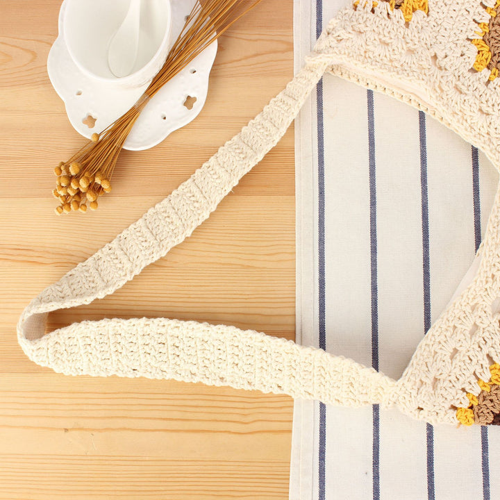 Crochet shoulder bag with playful sunflower pattern Bowlift