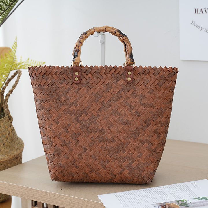 Handbag Made of Woven Bast Bowlift