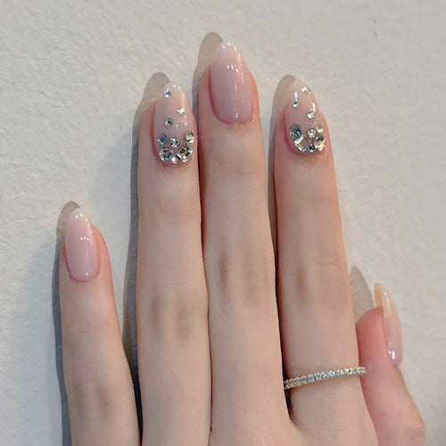 Artful nail art with delicate glitter accents and elegant French tip Bowlift