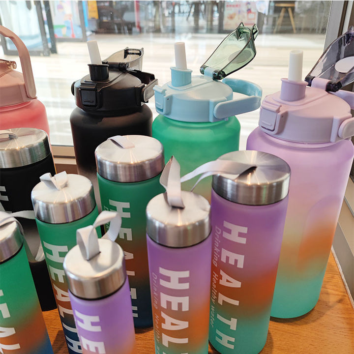 Women's insulated sports water bottle with ergonomic grip and leak-proof lid Bowlift