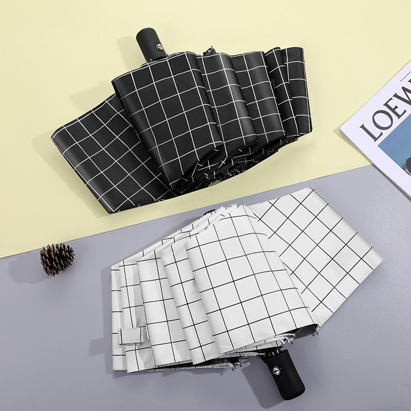 Compact Manual Eight-Rib Windproof Folding Umbrella with UV Protection and Grid Print Bowlift