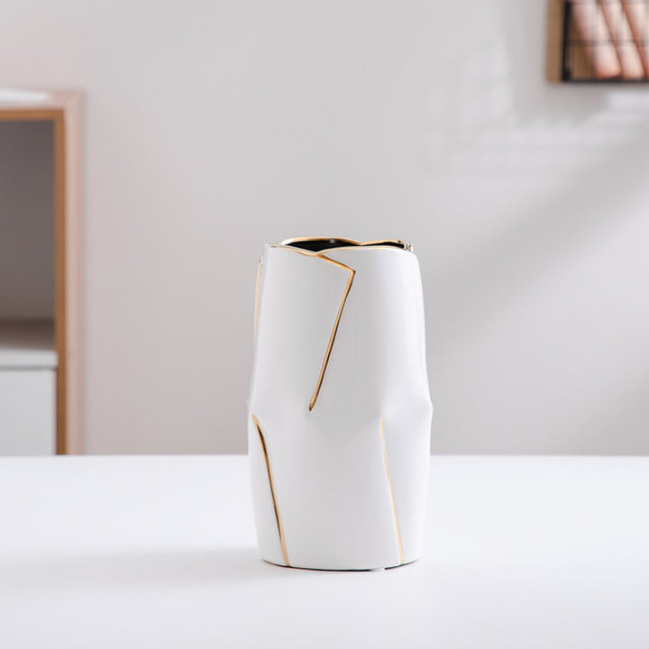 Decorative ceramic vase with golden accents Bowlift