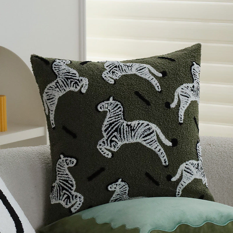 Decorative cushion cover with hand-tufted animal relief and soft boucle texture Bowlift