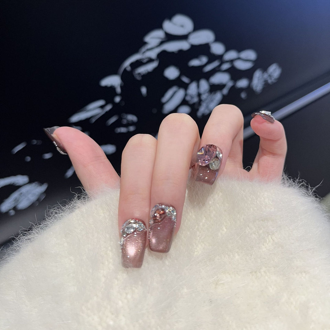 Decorative Press-On Nail Design with Gemstone Accents Bowlift
