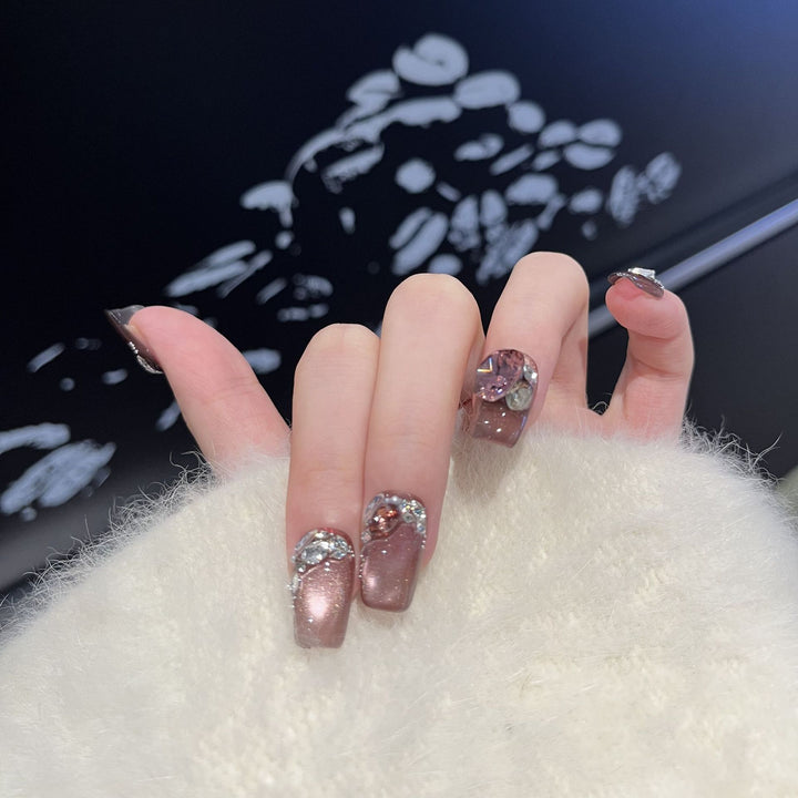 Decorative Press-On Nail Design with Gemstone Accents Bowlift