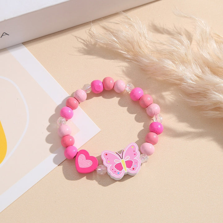 Playful bracelet with heart and butterfly charms Bowlift