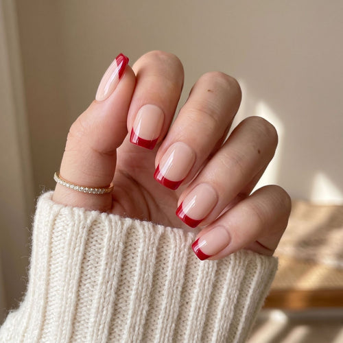 French Tip Nail Art with Elegant Red Accents Bowlift
