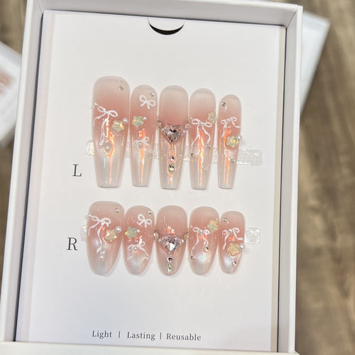 Elegant Press-On Nail Art Set with Chic Ribbon and Gem Accents Bowlift