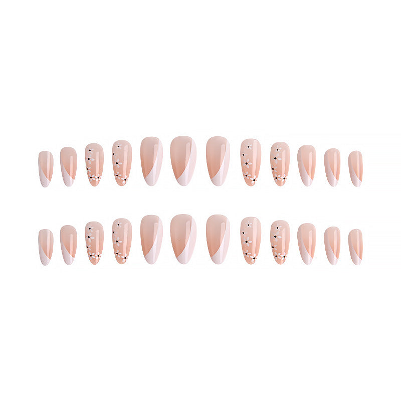 Artistic Nail Tips with Floral Accents Bowlift