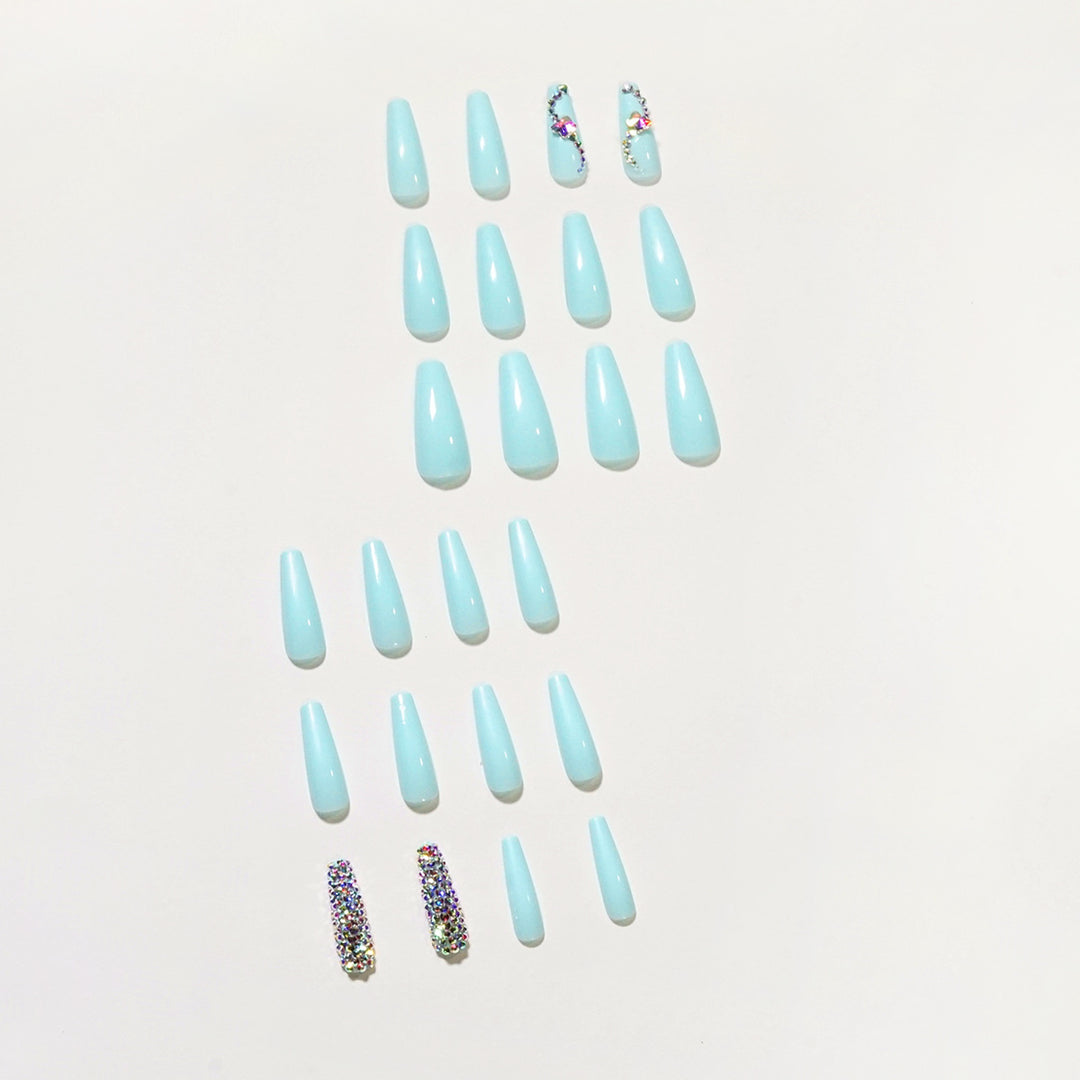 Glamorous artificial nails with sparkling rhinestone embellishments Bowlift