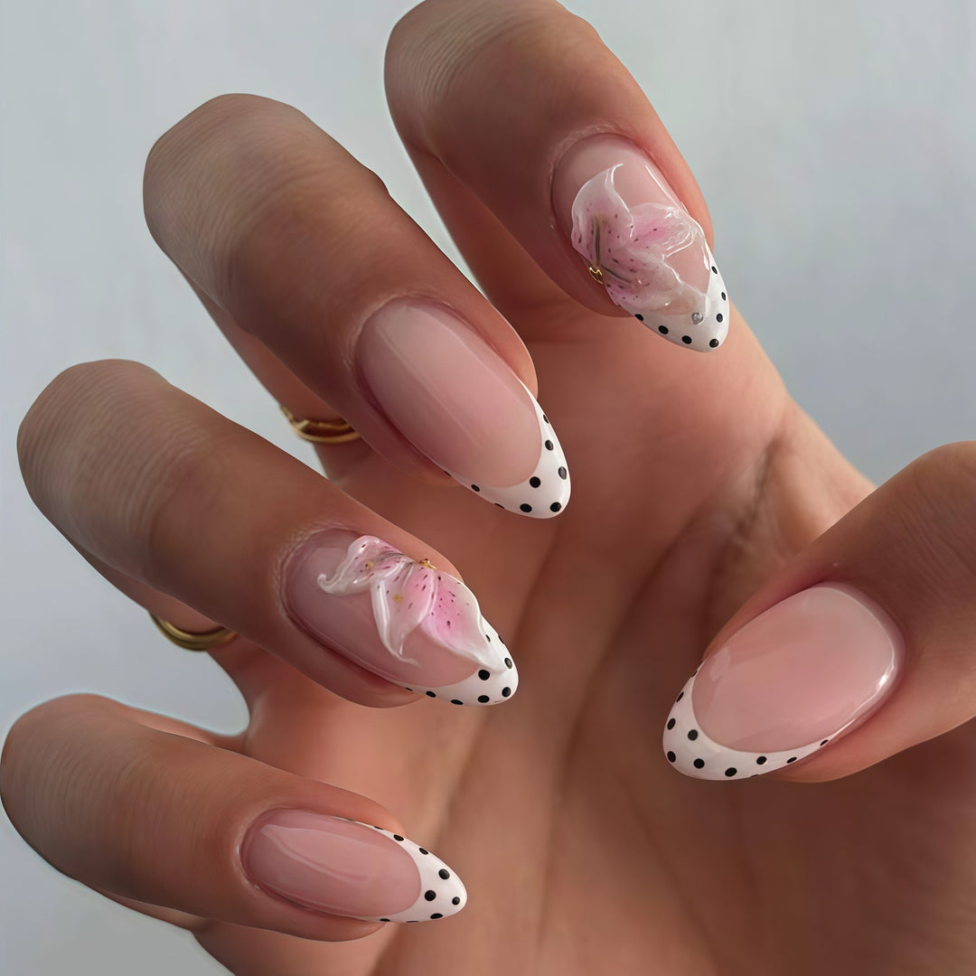 Elegantly Designed Floral Accompanied Stiletto Nail Art Extensions Bowlift