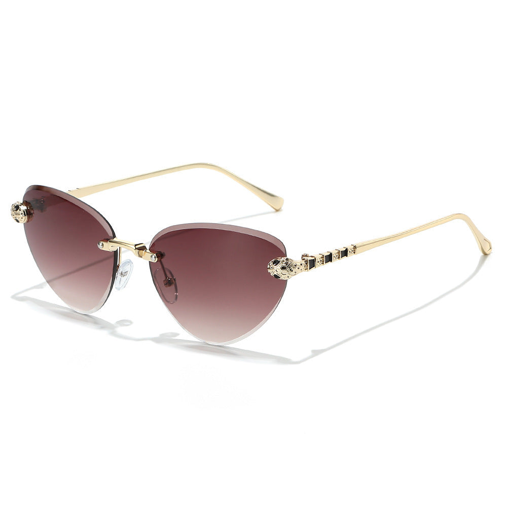 Designer Cat-Eye Sunglasses with Decorative Accents Bowlift