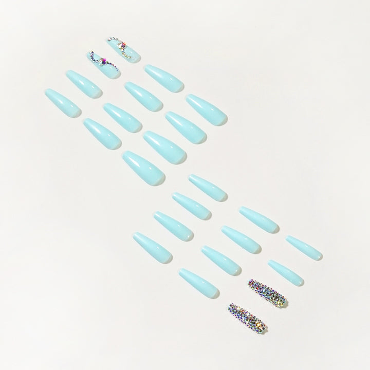 Glamorous artificial nails with sparkling rhinestone embellishments Bowlift