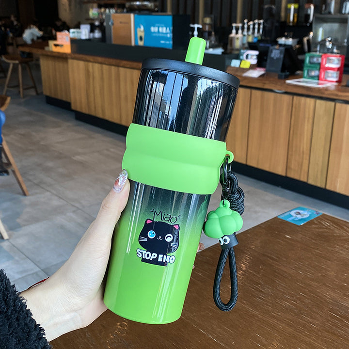 Women's playful coffee mug with silicone sleeve and integrated pendant Bowlift